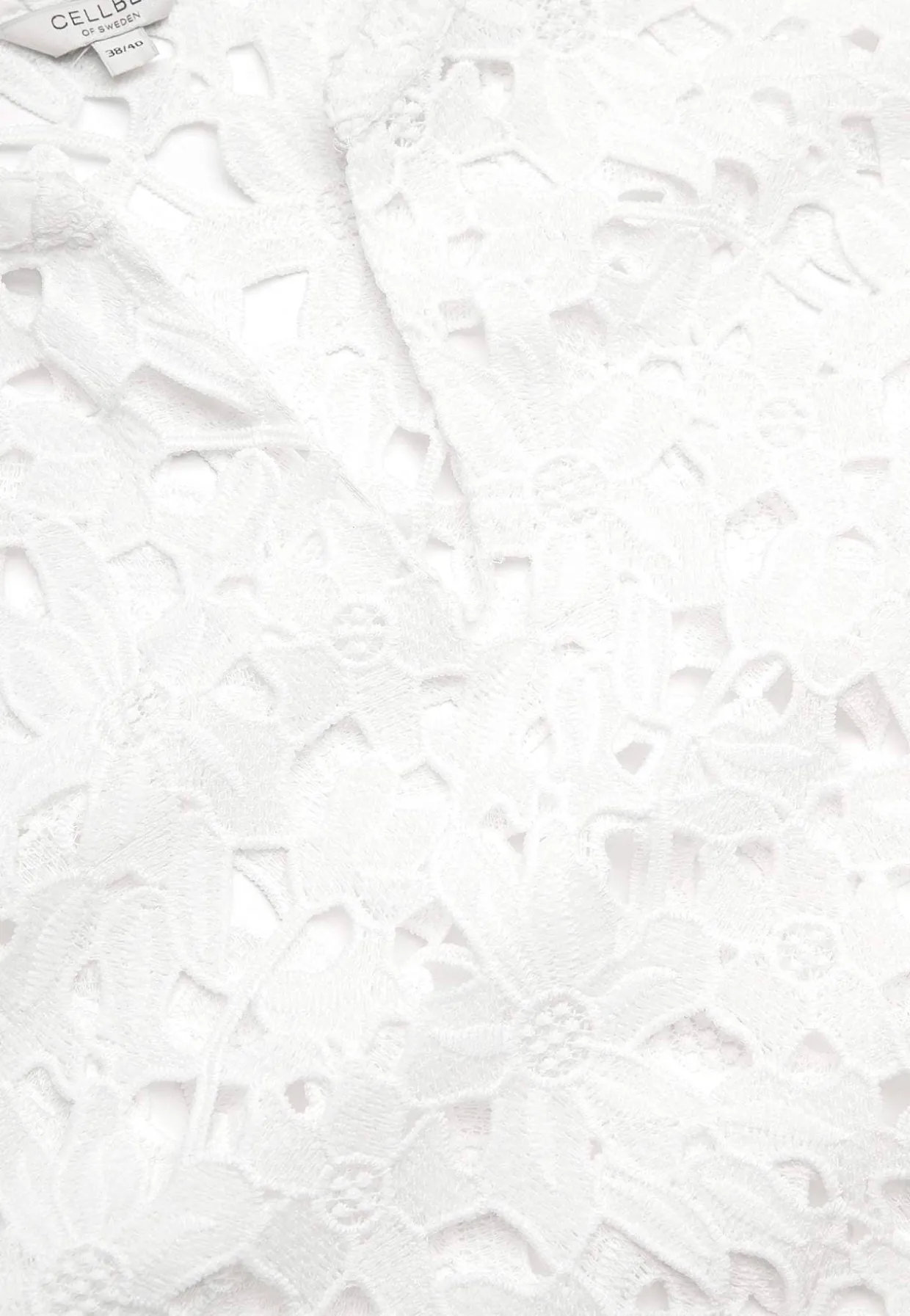 Blondebluse med et blomstermønster | Cellbes