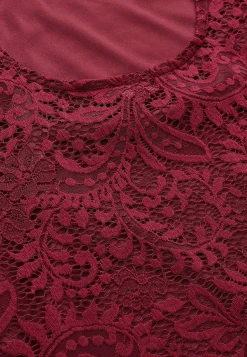 Blondetop med trompetærme