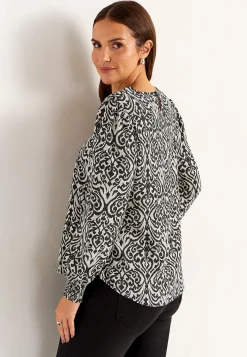 Bluse med smock ved manchetterne