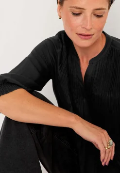 Bluse med syede lægge