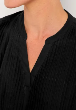 Bluse med syede lægge