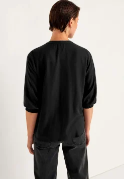 Bluse med syede lægge