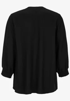 Bluse med syede lægge