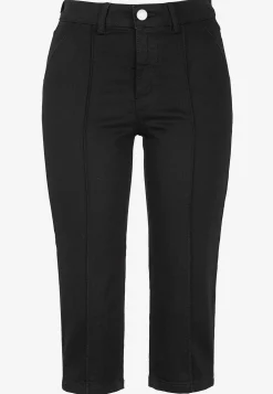 Elastiske crop jeans med syet pressefold