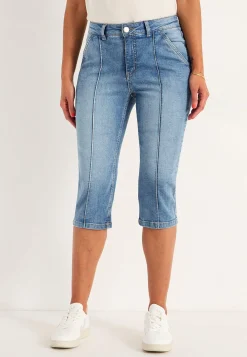 Elastiske crop jeans med syet pressefold
