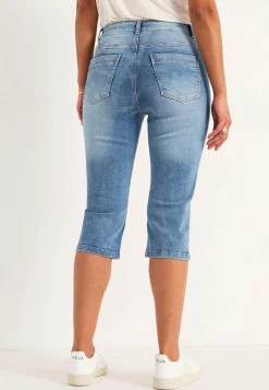 Elastiske crop jeans med syet pressefold
