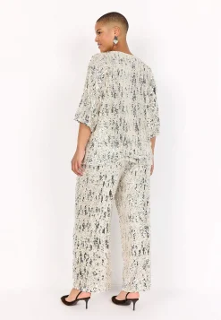 Festlig jerseytop med pailleter | Cellbes