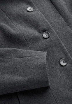 Frakke med opretstående krave