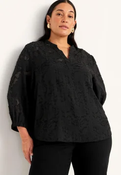 Jacquardvævet, næsten gennemsigtig bluse