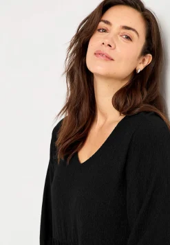 Jerseykjole med strukturmønster