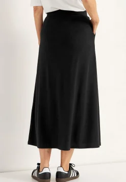 Jerseynederdel med svaj med lommer