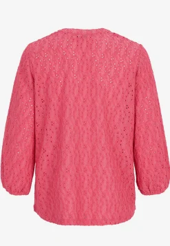 Jerseytop med broderet hulmønster