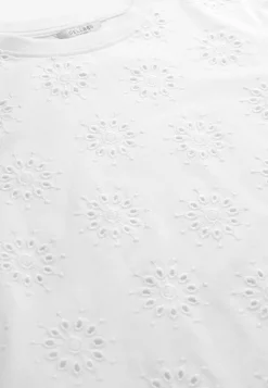 Jerseytop med broderet hulmønster | Cellbes