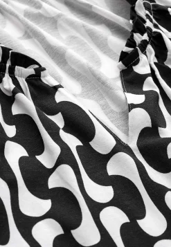 Jerseytunika med 3/4 lange ærmer