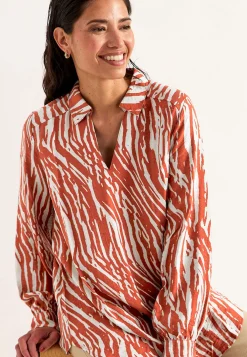 Langærmet, vævet tunika