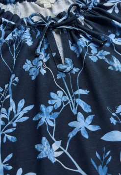 Mønstret jerseytop med flæsekant