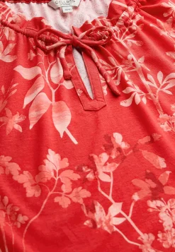 Mønstret jerseytop med flæsekant