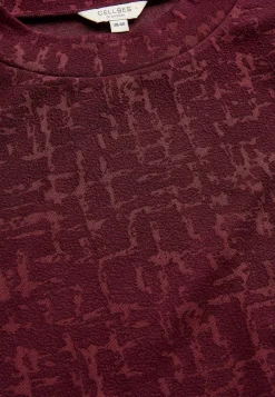 Mønstret kjole med sidelommer