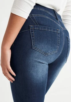 Shaping-jeans med bootcut og superstræk