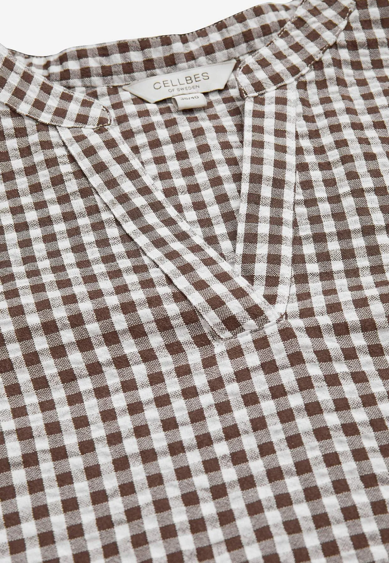 Småternet bluse i seersucker