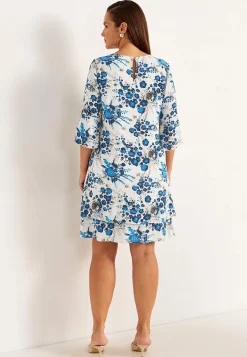 Sommeragtig festkjole med volanter