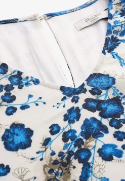 Sommeragtig festkjole med volanter