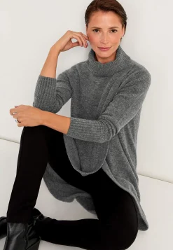 Strikket polotrøje med slå-om detalje foran