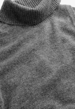 Strikket polotrøje med slå-om detalje foran