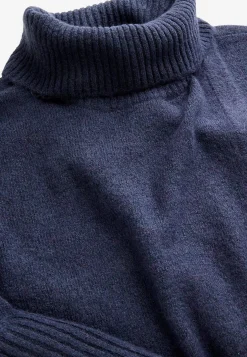 Strikket polotrøje med slå-om detalje foran