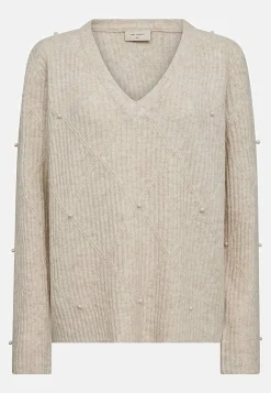 Strikket trøje med perledetaljer