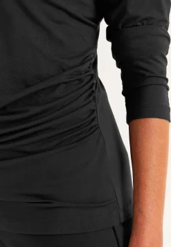 Top Premium i modal med rynkedetaljer