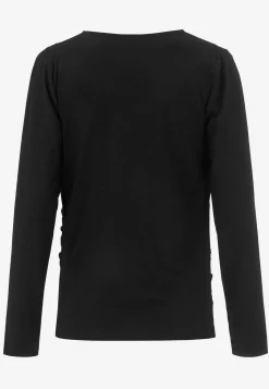 Top Premium i modal med rynkedetaljer