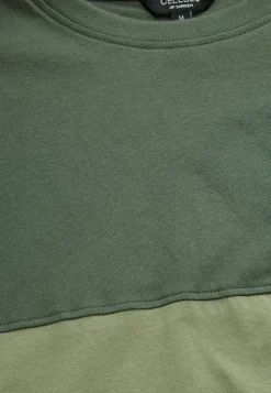 T-shirt med en bred stribe