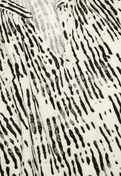 V-udskåret jerseytunika