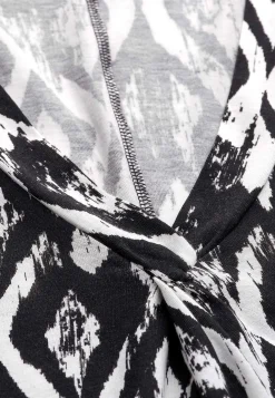 V-udskåret, ærmeløs jerseykjole