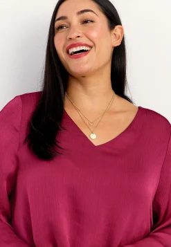 V-udskåret tunika med trompetærme