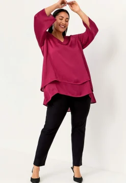 V-udskåret tunika med trompetærme