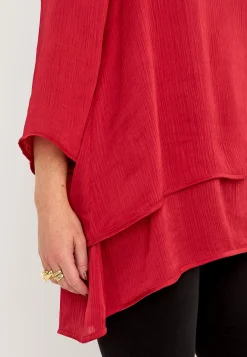 V-udskåret tunika med trompetærme