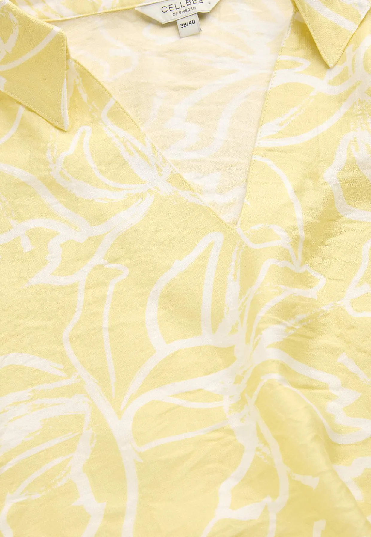 Vævet bluse med brede ærmer