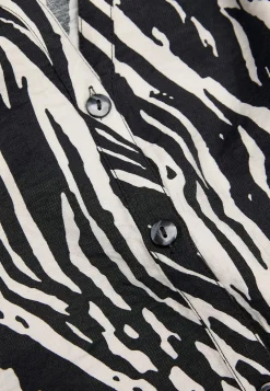 Vævet bluse med knapper